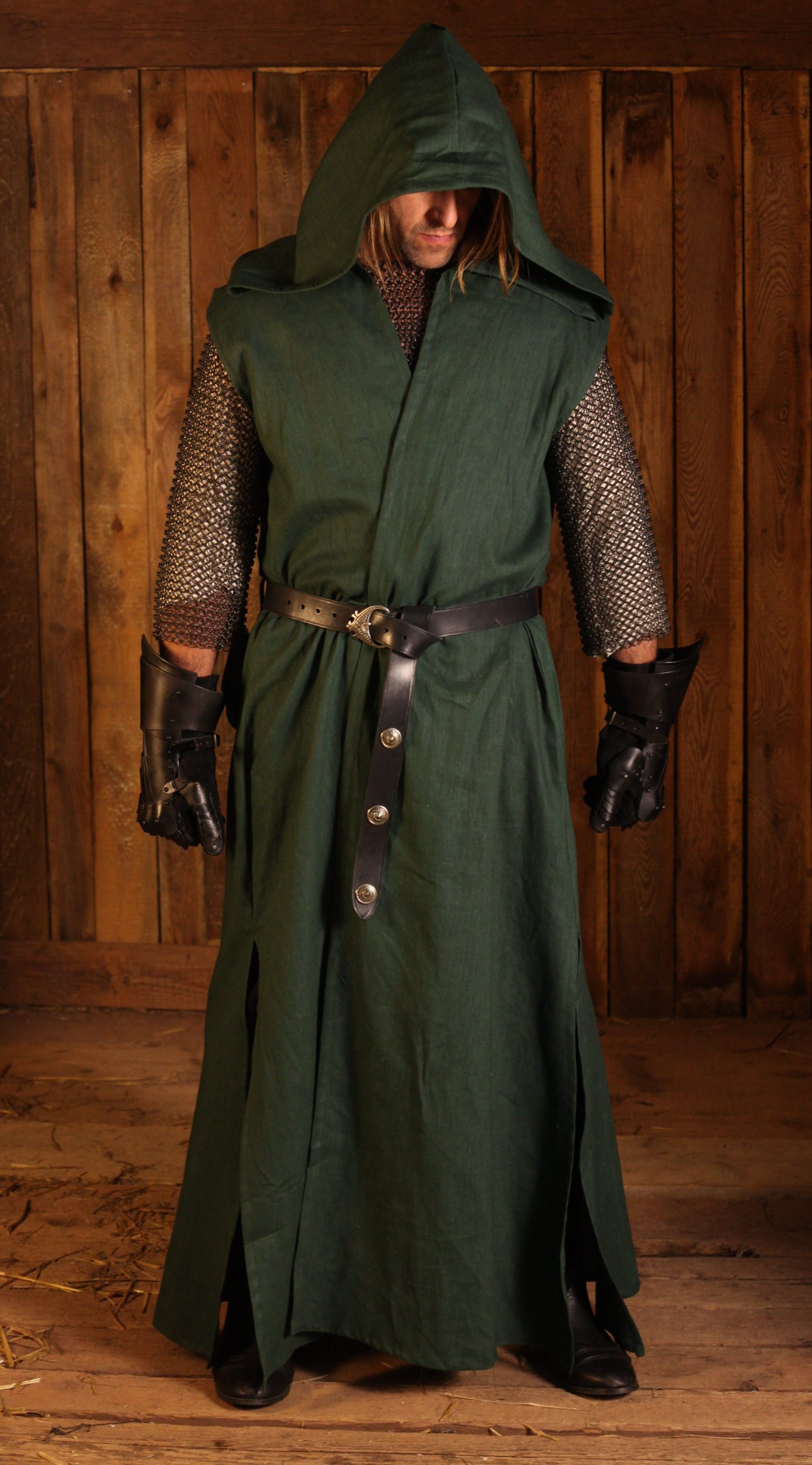 Lange grüne Weste mit Kapuze